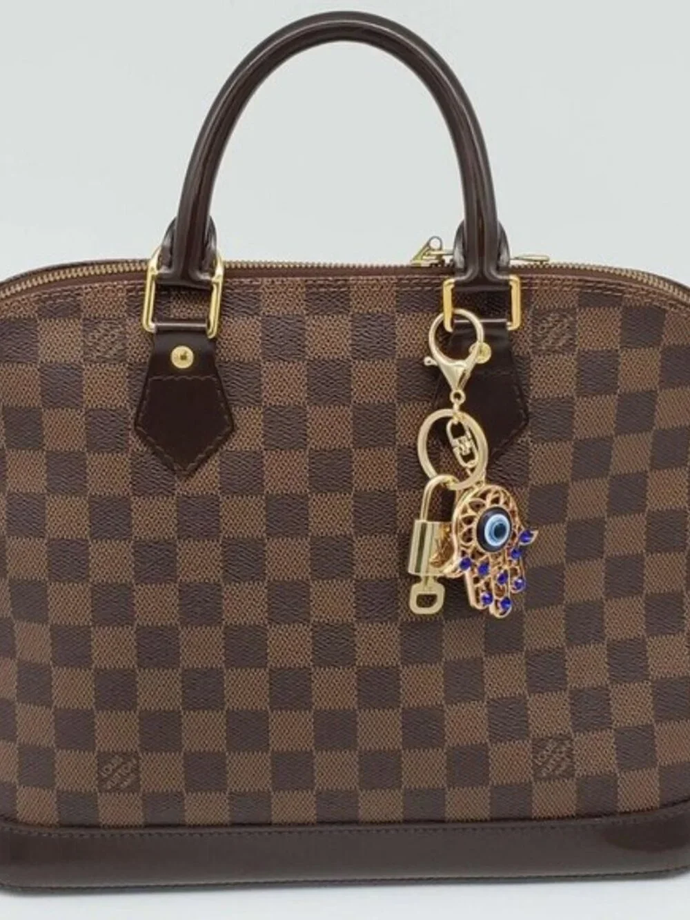 Louis Vuitton Gold Lock 🔑 Authentic LV Padlock + Bag Unbranded Evil Eye Charm